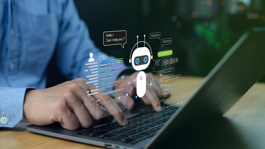 A close-up of hands typing on a laptop with a digital overlay of a robot assistant icon. The interface shows programming code, data blocks, and speech bubbles with the text "Hello! Can I help you?" representing the development and testing of an AI chatbot.