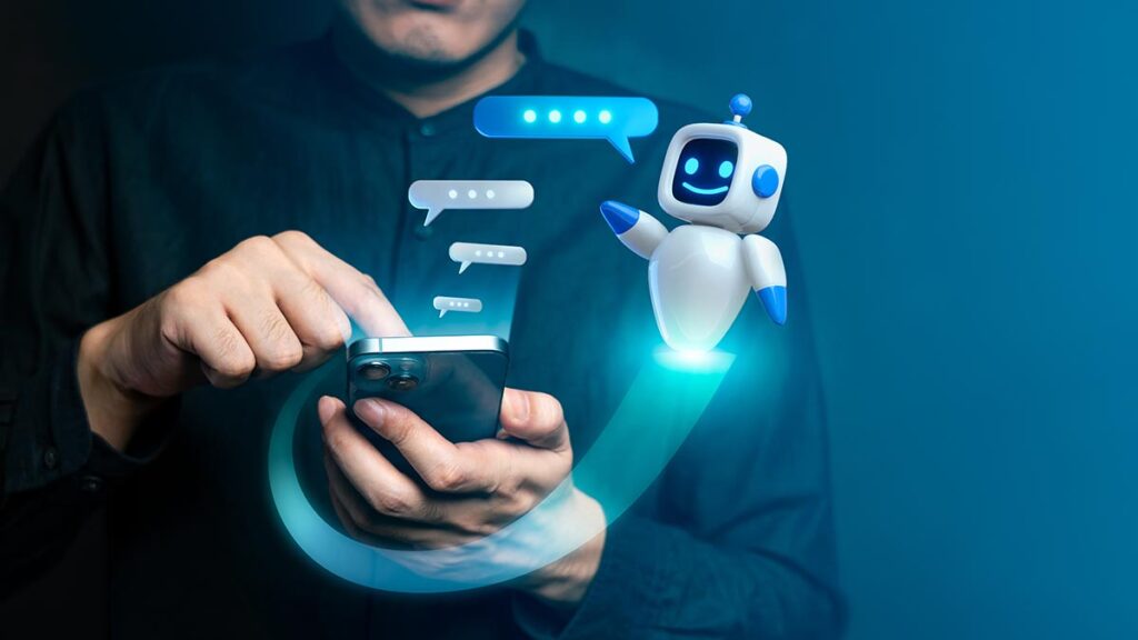 A person interacts with a smartphone while a friendly, 3D white-and-blue robot character hovers above it. A glowing blue light path curves from the phone toward the robot, with several semi-transparent speech bubbles floating between them to illustrate an active AI conversation.