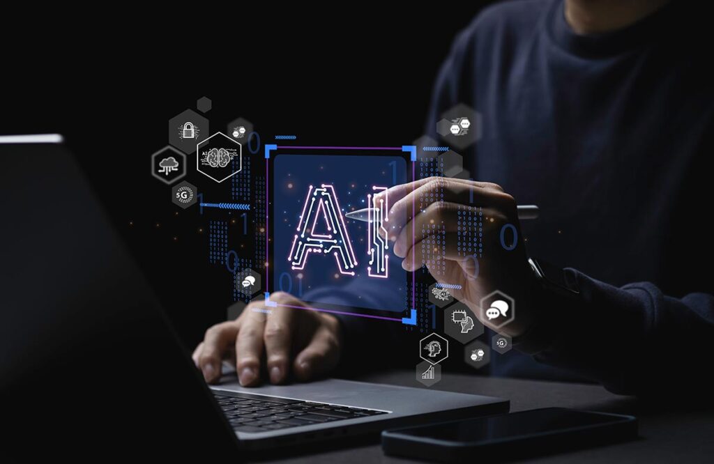 A person using a laptop with digital overlays representing artificial intelligence. A glowing "AI" icon is centered in a blue frame, surrounded by hexagonal icons for 5G, cloud computing, cybersecurity, and neural networks.